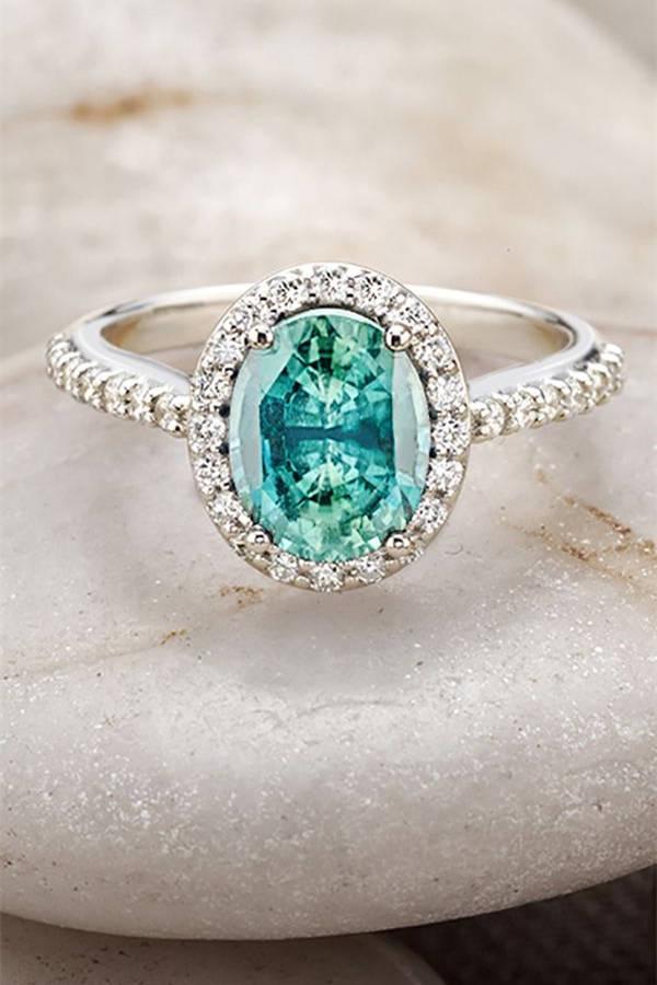 รูปภาพ:http://www.elegantweddinginvites.com/wp-content/uploads/2015/04/stunning-teal-colored-stone-engagement-rings.jpg