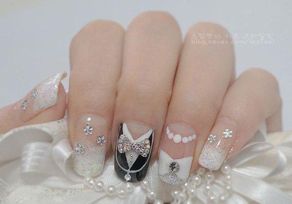 รูปภาพ:http://www.cuded.com/wp-content/uploads/2014/12/11-wedding-black-and-white-nails.jpg