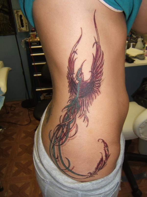 รูปภาพ:http://slodive.com/wp-content/uploads/2012/04/bird-tattoos/bird-of-paradise.jpg