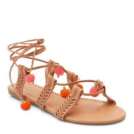 รูปภาพ:http://sheerluxe.com/sites/default/files/2016/07/new-look-cream-pom-pom-ghillie-sandals.jpg