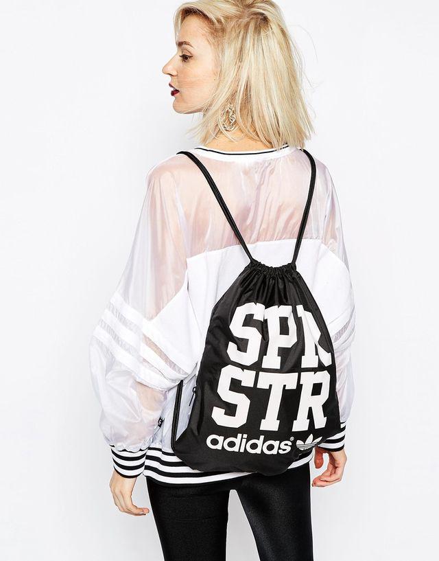 รูปภาพ:https://cdnc.lystit.com/photos/606d-2015/03/28/adidas-blackwhite-originals-gymsack-backpack-product-2-117687784-normal.jpeg