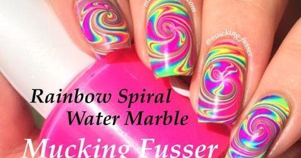 รูปภาพ:https://www.askideas.com/media/75/Rainbow-Spiral-Water-Marble-Nail-Art-Idea.jpg