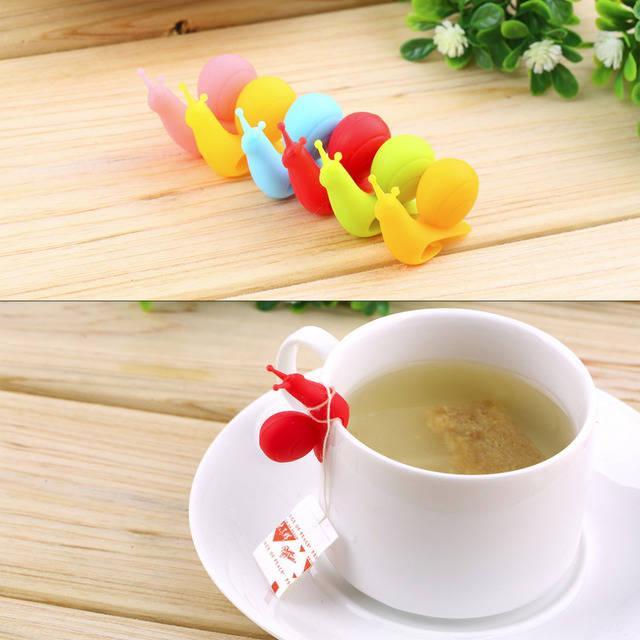 รูปภาพ:http://g03.a.alicdn.com/kf/HTB1sShFIXXXXXaZXVXXq6xXFXXXq/6PCS-Hot-New-Cute-Snail-Shape-Silicone-Tea-Bag-Holder-Cup-Mug-Candy-Colors-Gift-Set.jpg