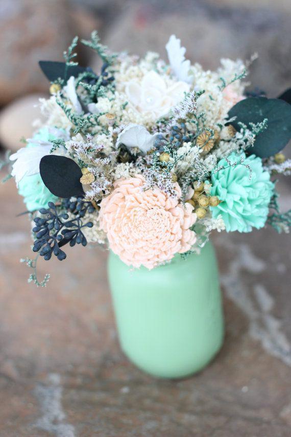 รูปภาพ:http://www.weddinginclude.com/wp-content/uploads/2016/05/mason-jars-wedding-centerpieces-with-mint-and-peach.jpg