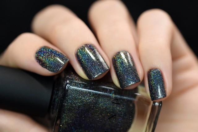 รูปภาพ:http://ninja-cosmico.ninjacosmico.netdna-cdn.com/wp-content/uploads/2016/11/ILNP-Missed-Calls-Black-Holographic-Nail-Polish.jpg