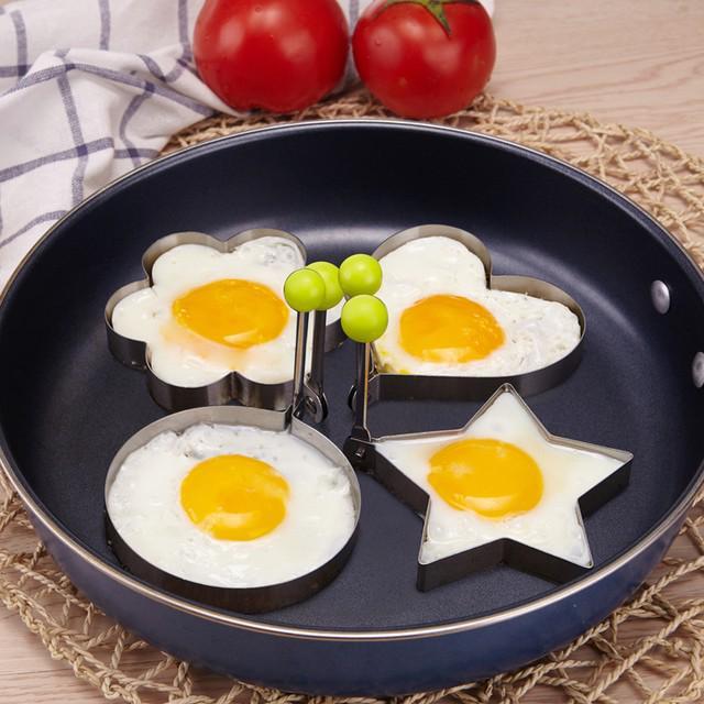 รูปภาพ:https://ae01.alicdn.com/kf/HTB165YONVXXXXa.apXXq6xXFXXXQ/1set-4pcs-funny-stainless-steel-Heart-Round-fried-egg-font-b-Shaper-b-font-mold-surprise.jpg