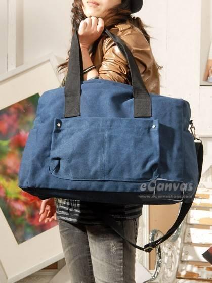 รูปภาพ:http://www.ecanvasbags.com/3939/black-messenger-bag-girls-travel-bag-canvas-big-shoulder-bag-5-colors.jpg