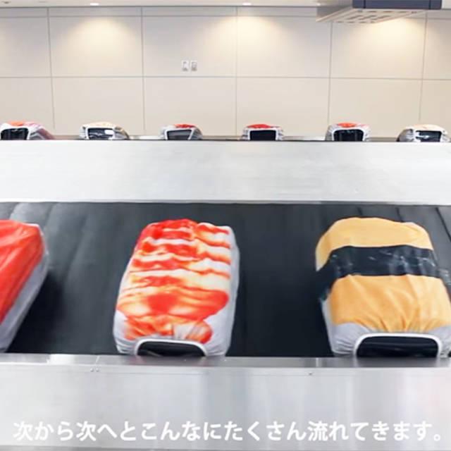 ภาพประกอบบทความ สุดแปลก!! ถุงผ้าคลุมกระเป๋าเดินทาง 'ลายซูชิ' ชิ้นใหญ่แสนน่ากิน