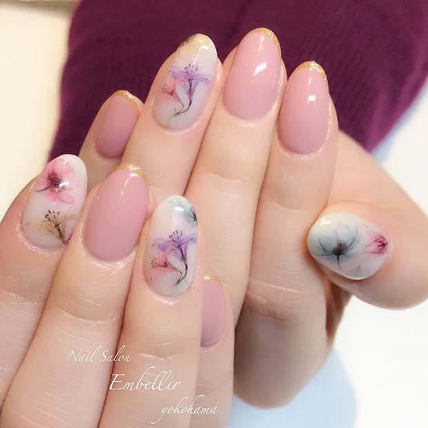 รูปภาพ:https://stayglam.com/wp-content/uploads/2018/03/Stunning-Spring-Floral-Nail-Idea.jpg
