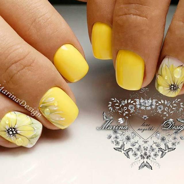 รูปภาพ:https://naildesignsjournal.com/wp-content/uploads/2018/05/yellow-flowers-nails-short-short-square-hand-painted.jpg