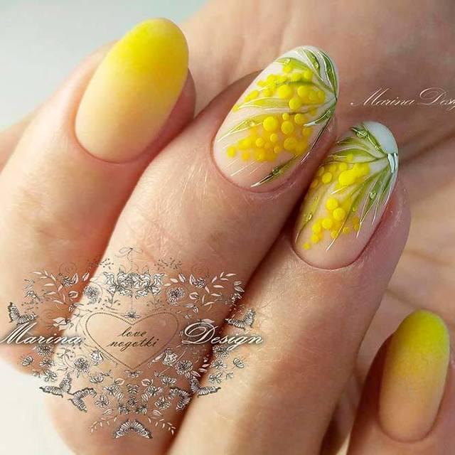 รูปภาพ:https://naildesignsjournal.com/wp-content/uploads/2018/05/yellow-flowers-nails-oval-3d-mimosa.jpg