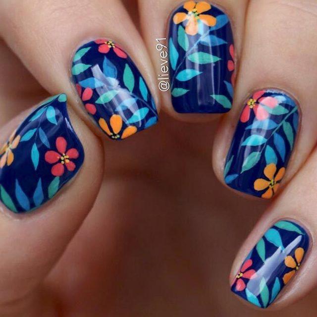 รูปภาพ:https://lh3.googleusercontent.com/--N1Giuhe89w/WrwjHvyoOCI/AAAAAAAAL3E/SeGie0VuccYYNskT2IpceMm1shm9MIcKQCHMYCw/s0/cobalt-blue-nails-designs-colorful-floral-pattern.jpg