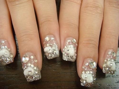 รูปภาพ:https://i1.wp.com/fixstik.com/wp-content/uploads/2013/07/Awesome-Acrylic-Crystal-Nails-Last-2012.jpg?fit=500%2C375