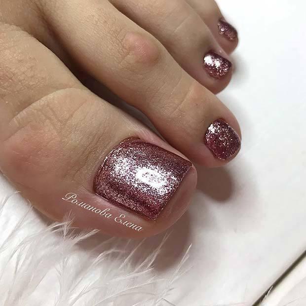 รูปภาพ:https://stayglam.com/wp-content/uploads/2018/03/Chic-Pink-Glitter-Nails.jpg