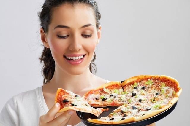 รูปภาพ:http://www.skinnymom.com/wp-content/uploads/2014/01/woman-eating-pizza.jpg