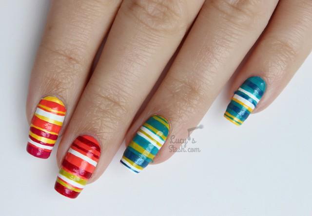 รูปภาพ:http://img.over-blog-kiwi.com/0/70/32/41/20160825/ob_20578b_rainbow-striped-nails-with-leighton-de.jpg