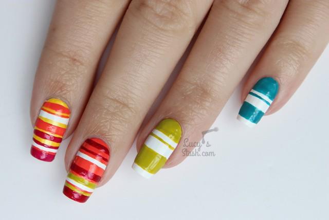รูปภาพ:http://img.over-blog-kiwi.com/0/70/32/41/20160825/ob_6b254a_rainbow-striped-nails-with-leighton-de.jpg
