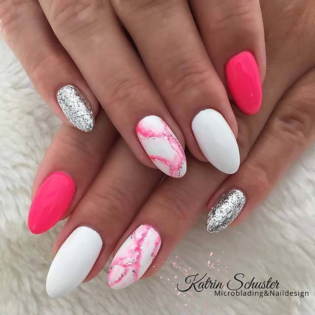 รูปภาพ:https://stayglam.com/wp-content/uploads/2018/12/Trendy-Pink-Marble-Nails.jpg