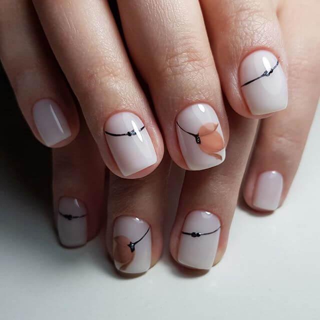 ภาพประกอบบทความ น่ารักจนลืมร้อน! รวมไอเดียเล็บ "Cute Nails" แต่งสวยท้าแดดซัมเมอร์