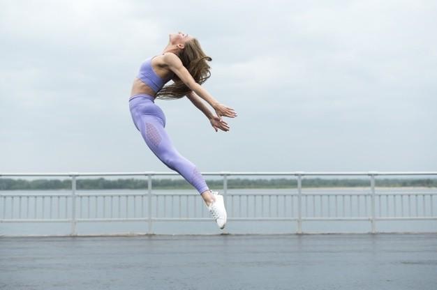 รูปภาพ:https://image.freepik.com/free-photo/beautiful-woman-jumping-long-shot_23-2148264845.jpg