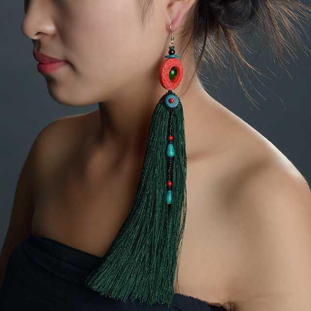 รูปภาพ:http://i01.i.aliimg.com/wsphoto/v0/1528753493_1/Gorgeous-Pure-Handmade-Distinctive-Original-Chinese-Style-Exaggerated-Tassels-Long-Single-Earring-Ethnic-Jewelry.jpg