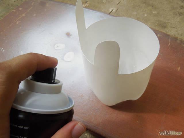 รูปภาพ:http://pad3.whstatic.com/images/thumb/5/51/Make-a-Cute-Plant-Pot-Holder-Out-of-Plastic-Bottle-Step-8.jpg/728px-Make-a-Cute-Plant-Pot-Holder-Out-of-Plastic-Bottle-Step-8.jpg