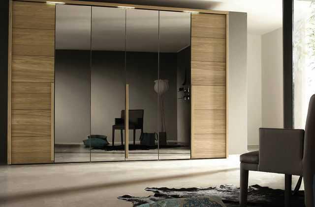 รูปภาพ:http://grezu.com/wp-content/uploads/2014/12/Fascinating-wardrobes-designs-for-bedrooms-Design-Wardrobes-And-Closets-_-Wonderful-Wooden-Glass-Laminate-Large-Wardrobe-cool-modern-wardrobes-designs-for-bedrooms.jpg