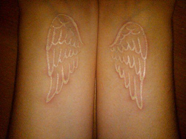 รูปภาพ:http://www.cuded.com/wp-content/uploads/2014/02/14-White-ink-wing-tattoo.jpg