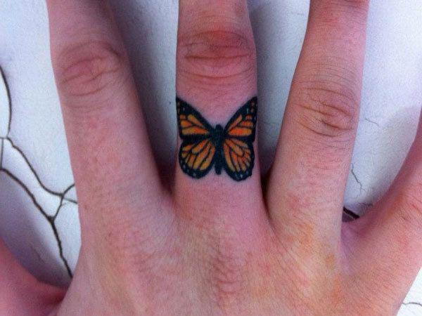 รูปภาพ:http://slodive.com/wp-content/uploads/2012/09/small-butterfly-tattoos/finger-tattoo.jpg