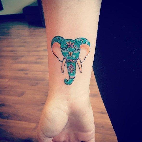 รูปภาพ:http://www.spiritustattoo.com/wp-content/uploads/2015/11/small-colorful-elephant-tattoo-on-wrist.jpg