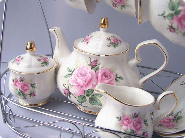 รูปภาพ:http://g01.a.alicdn.com/kf/HTB1aIMkIVXXXXaOaXXXq6xXFXXXJ/Hand-Painted-Pink-Flower-Cups-and-Saucers-Bone-China-15-Piece-Cool-Coffee-Mugs-English-Teapot.jpg