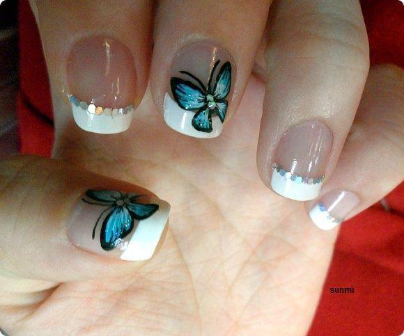 รูปภาพ:http://www.prettydesigns.com/wp-content/uploads/2014/08/Butterfly-Nail-Design-for-French-Manicure.jpg