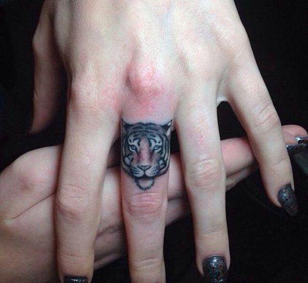 รูปภาพ:http://www.cuded.com/wp-content/uploads/2014/02/25-tiger-finger-tattoo.jpg