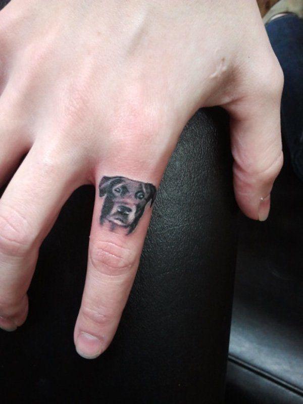 รูปภาพ:http://www.cuded.com/wp-content/uploads/2014/02/5-Dog-finger-tattoo.jpg