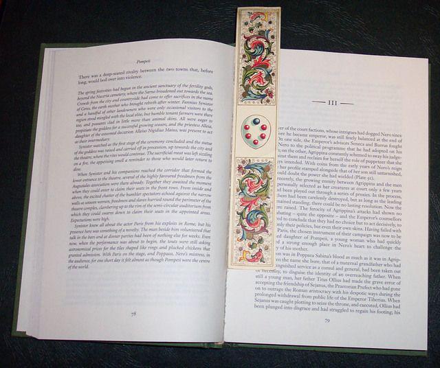 รูปภาพ:https://upload.wikimedia.org/wikipedia/en/0/04/Book_with_florentine_paper_bookmark.jpg