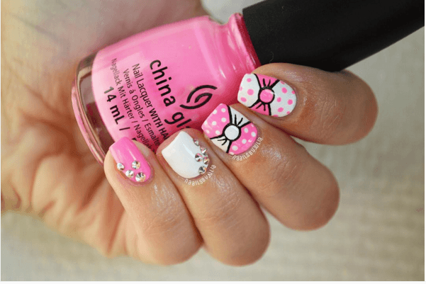 รูปภาพ:http://bmodish.com/wp-content/uploads/2016/02/pink-and-white-bow-nail-design-bmodish.png