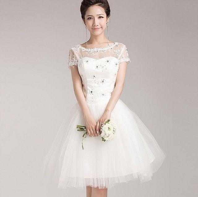 รูปภาพ:http://i00.i.aliimg.com/wsphoto/v1/1998274900_1/Free-shipping-White-Short-Wedding-Dress-2014-short-sleeve-high-quality-lace-bride-dresses-special-occasion.jpg