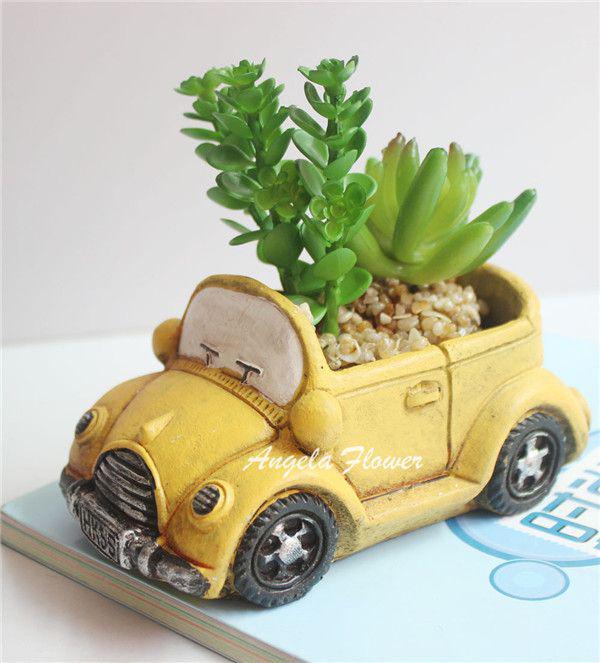 รูปภาพ:http://g01.a.alicdn.com/kf/HTB1zRlXLpXXXXbpXVXXq6xXFXXX0/Moda-MINI-coche-resina-maceta-Micro-paisaje-flor-de-cactus-florero-con-fleshiness-artificial-planta-verde.jpg