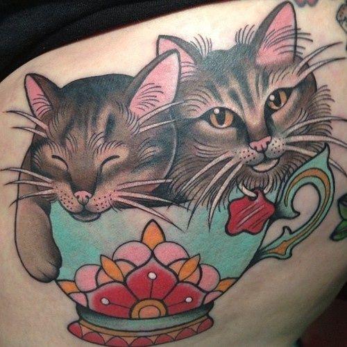 รูปภาพ:http://tattoomagz.com/wp-content/uploads/Cats-in-a-teacup-tattoo-by-Clare-Hampshire.jpg