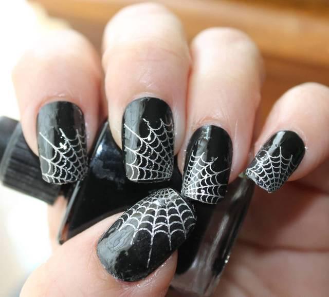 รูปภาพ:https://lh3.googleusercontent.com/-p6dWzQkVMfM/V2wE93CpdWI/AAAAAAAAB1o/u6KUVtRjLUQ/s0/Black-Nails-Silver-Spider-Web-Halloween-Nail-Art-Designs.jpg