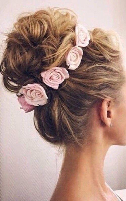 รูปภาพ:http://hairstylehub.com/wp-content/uploads/2016/10/curled-bun-with-flowers.jpg