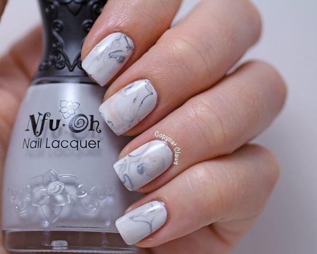 รูปภาพ:http://3.bp.blogspot.com/-L7JgeYwrPZo/Uo_WMlI9MVI/AAAAAAAAA-k/NkqhCVbp6RY/s1600/marble-nail-art-3.jpg