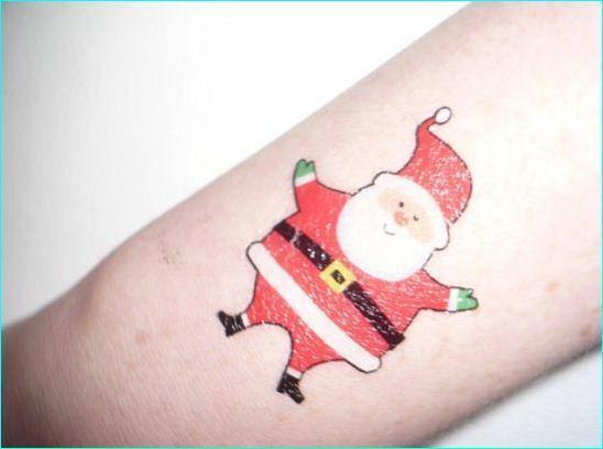 รูปภาพ:http://www.kooltattooideas.com/wp-content/uploads/2015/12/Happy-Santa-Claus-Christmas-Tattoo-6.jpg