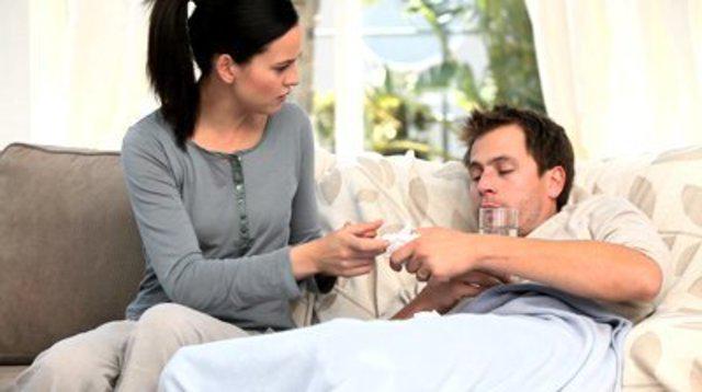 รูปภาพ:http://buzzkenya.com/wp-content/uploads/2015/01/stock-footage-worried-woman-giving-pills-to-her-sick-husband-1.jpg