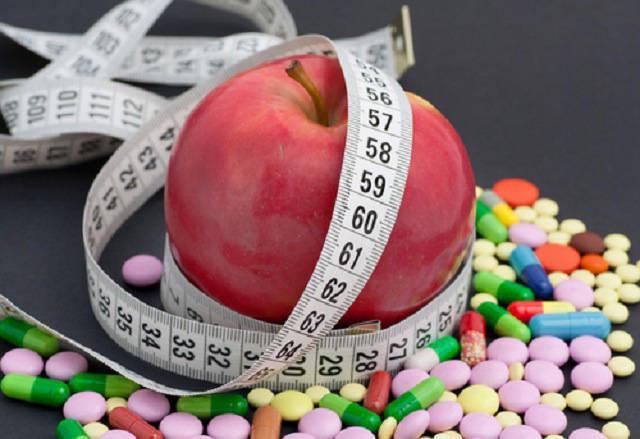 รูปภาพ:http://obesity.procon.org/files/1-obesity-images/diet-pills-apple-and-measuring-tape.jpg