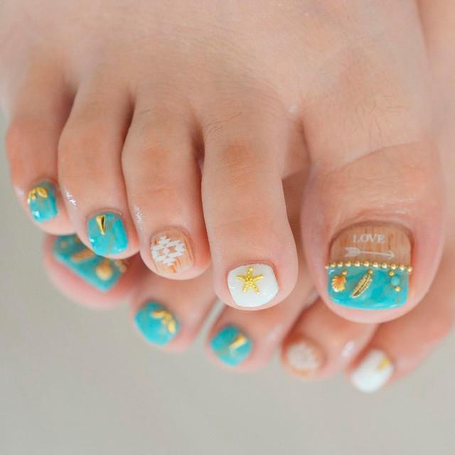 รูปภาพ:https://naildesignsjournal.com/wp-content/uploads/2017/04/pretty-toe-nails-designs-4.jpg