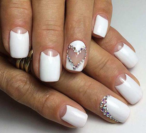 รูปภาพ:http://i.styleoholic.com/2017/05/07-white-half-moon-manicure-with-lots-of-rhinestones-for-a-bride.jpg