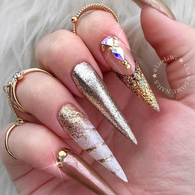 รูปภาพ:https://naildesignsjournal.com/wp-content/uploads/2017/03/stiletto-nail-designs-you-adore-5.jpg