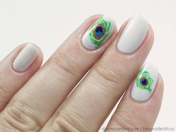 รูปภาพ:http://www.divinecaroline.com/sites/divinecaroline.com/files/peacock-feather-nail-art_108562.jpg