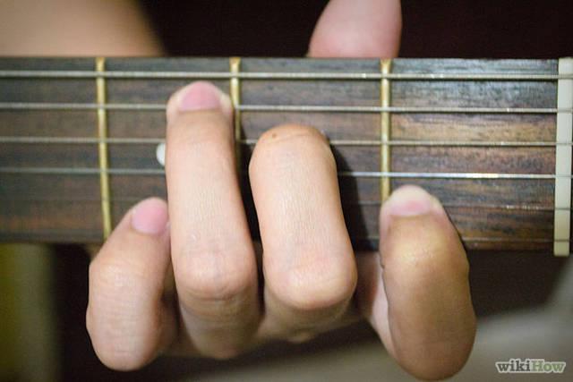 รูปภาพ:http://pad2.whstatic.com/images/thumb/6/6a/Finger-all-chords-on-guitar-Step-3.jpg/670px-Finger-all-chords-on-guitar-Step-3.jpg